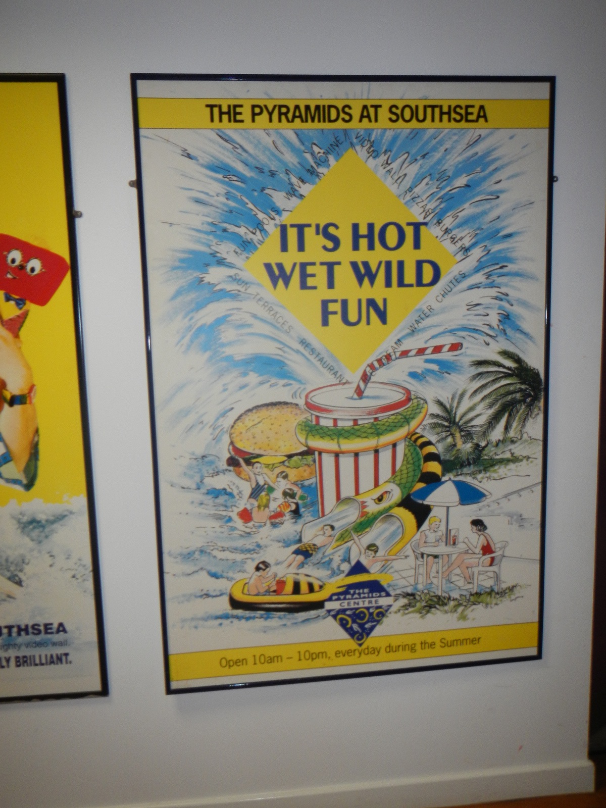  ​poster promoting the slides in the Pyramid Centre pool. 