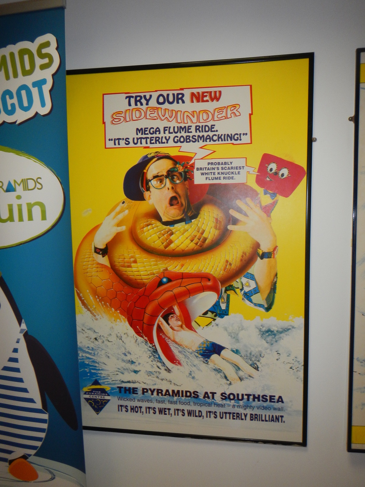  ​poster promoting the slides in the Pyramid Centre pool. 