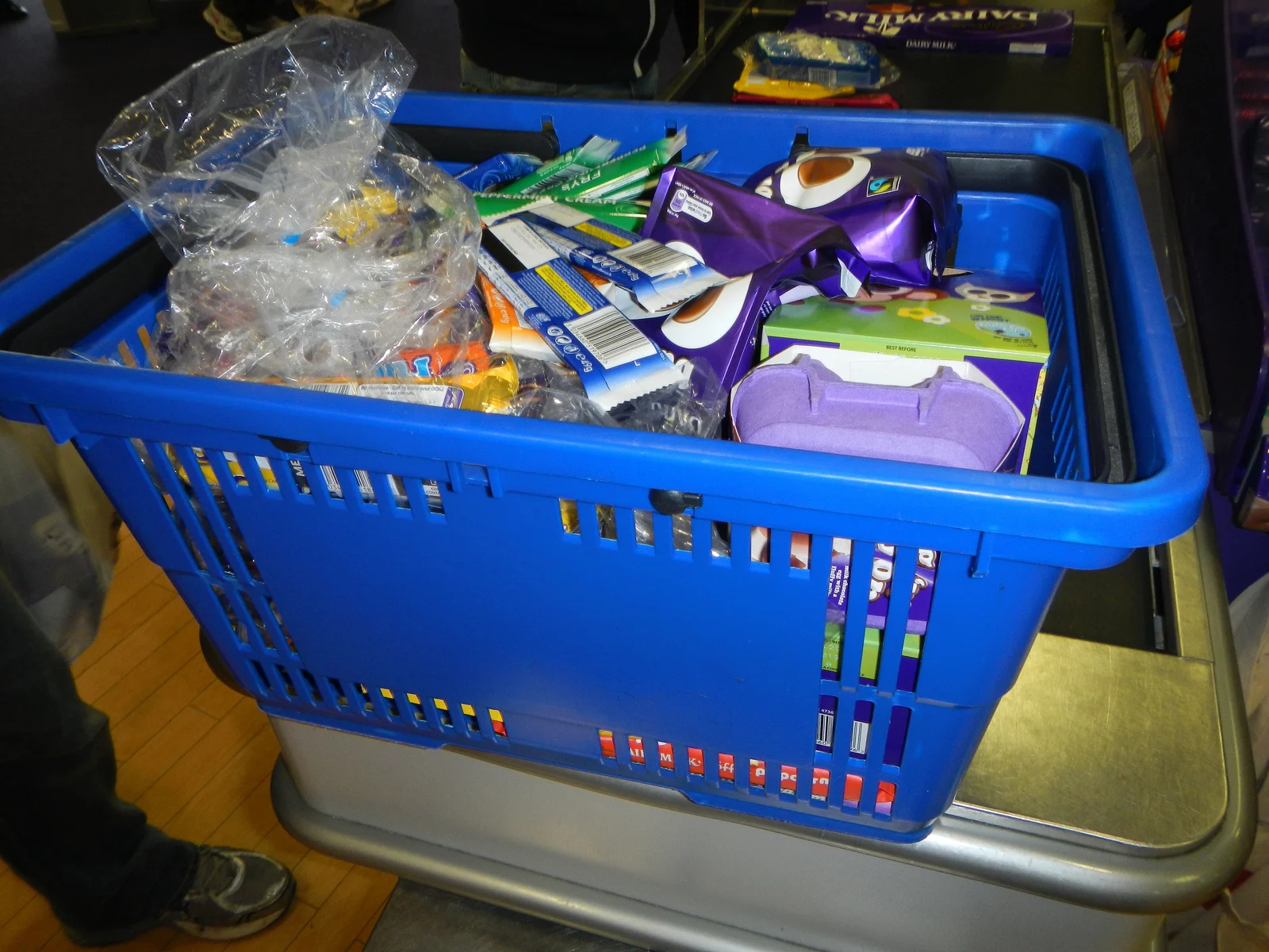 A very full basket of Cadbury products.