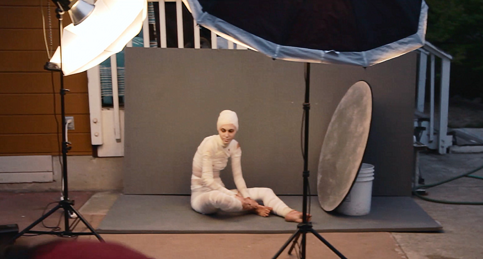 While this isn't super sharp as it is a screenshot from the behind the scenes video we made, it shows the setup of lights and background around Cierra. 
