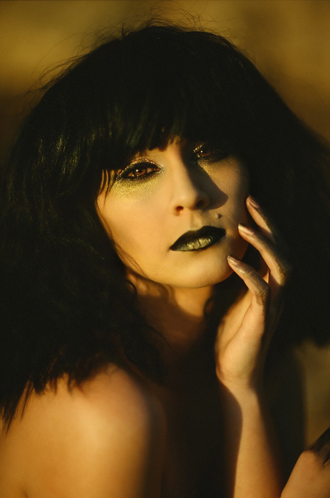 This was metered for the mid tones and while some detail was lost in the shadows, its what I was going for. Something warm and contrasty. It’s interesting how using such a shallow depth of field can soften the skin and make it look kind of retouched. I did a little detail retouching but nothing major on this shot. I shifted the yellows a little more orange but otherwise the color came out nicely in this scan.