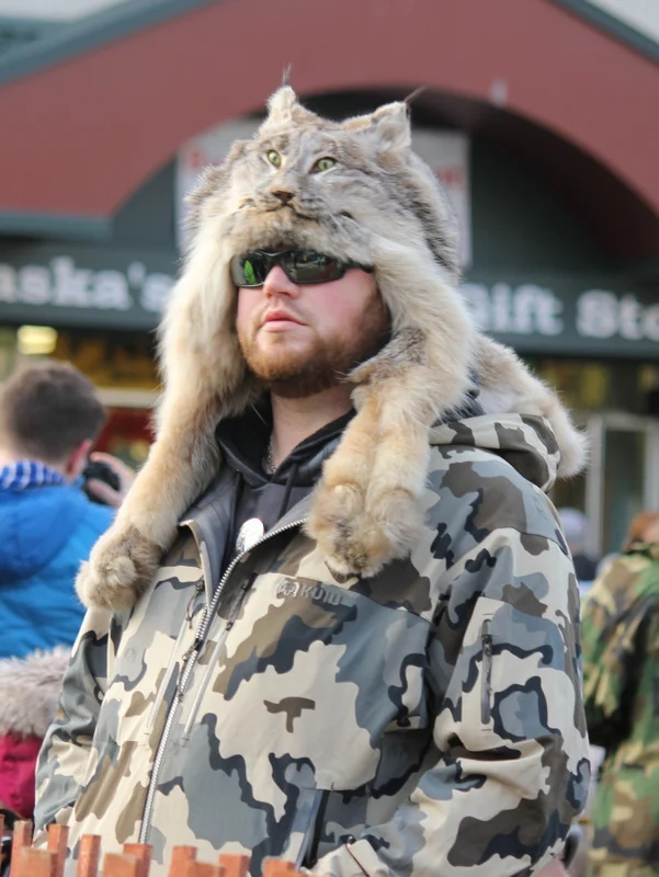 This dude was strolling around LIKE A BOSS. Because with a green eyed cat on your head and black-out sunnies, HE CAN.