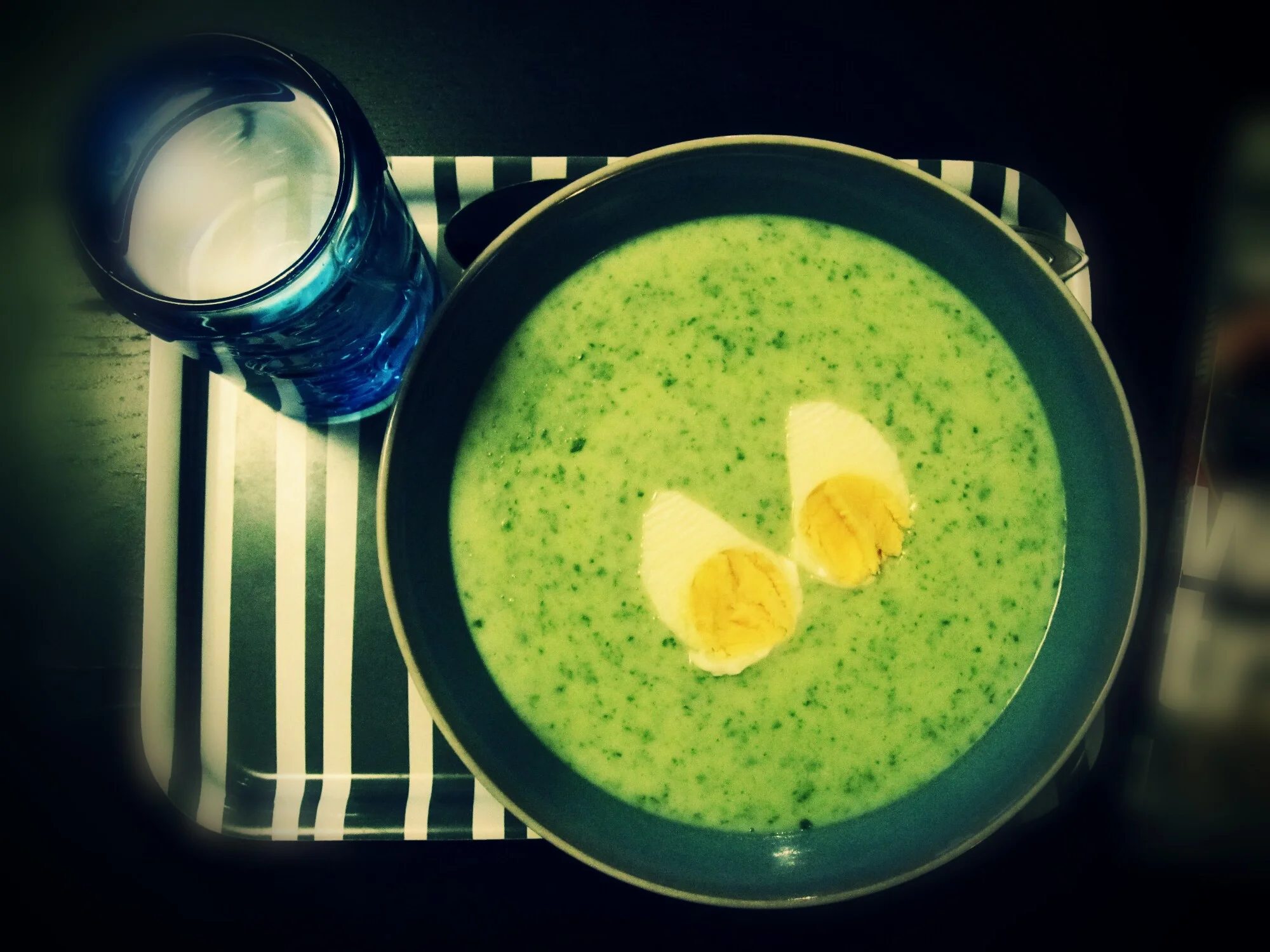 Yummy warm spinach soup with eggs