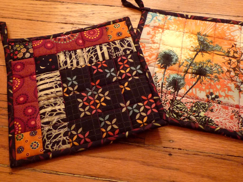 A terrible photo! This is one of 3 pairs of pot holders I've managed to bring to completion this week. Will share more photos in a separate post soon.