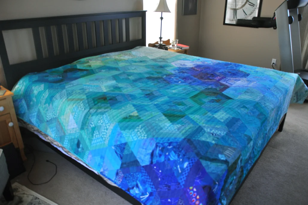 AND I got to see it spread on a bed... my house can't provide a big enough bed in a big enough room to test this one out. 