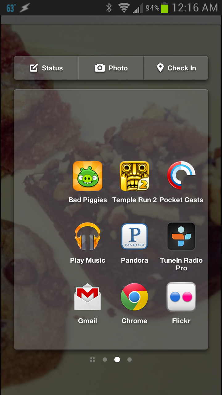 Facebook Home's App launcher. Notice the Facebook Check-in, Photo, and Status tabs at the top ( Credit: TLCP/Jimmy Principe)
