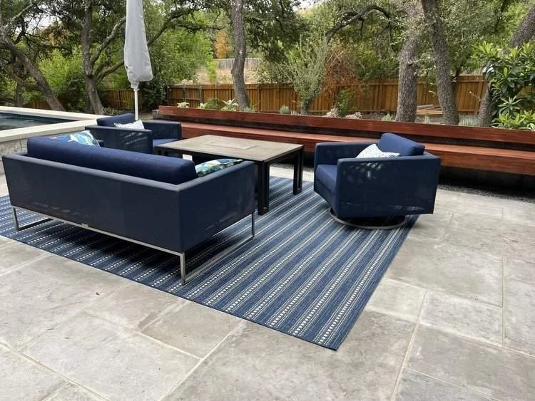 Outdoor Mortared Limestone Patio with an IPE wood bench built onto a steel planter.