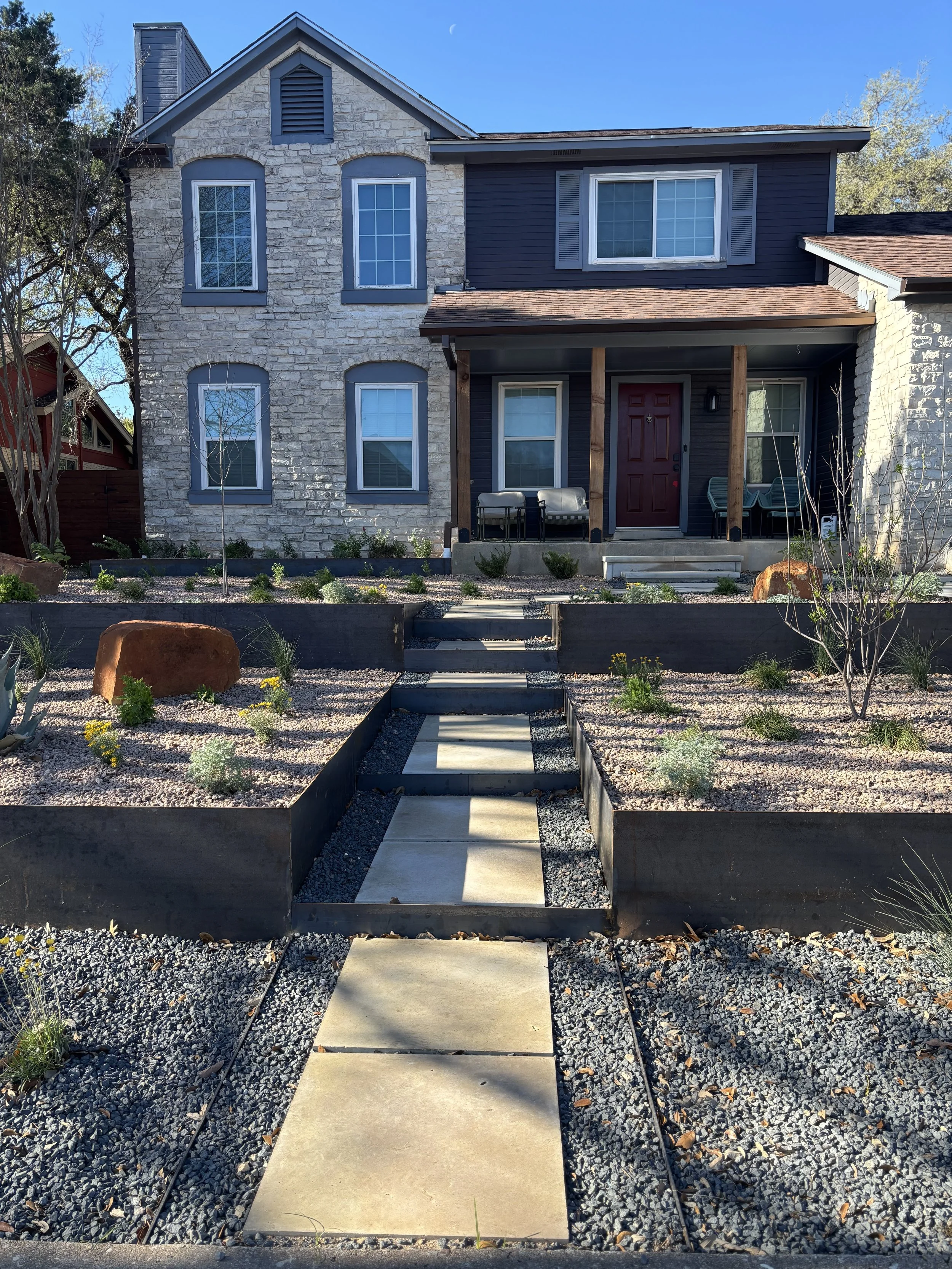 New Lueder Limestone pathway with steel edging or retaining wall.