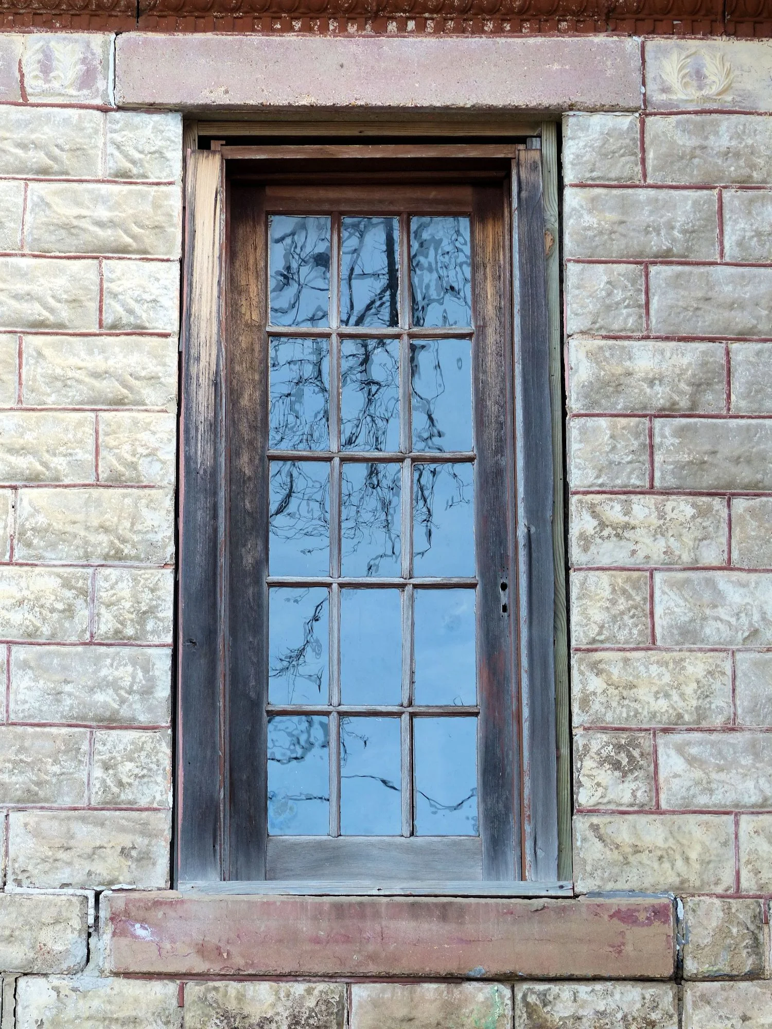 Creepy window on abandoned building