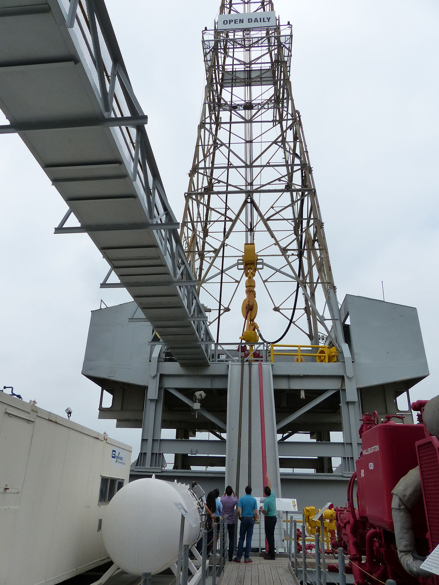 Looking up to the drill floor from the pipe deck . That is pipe and casing laying on the slide .