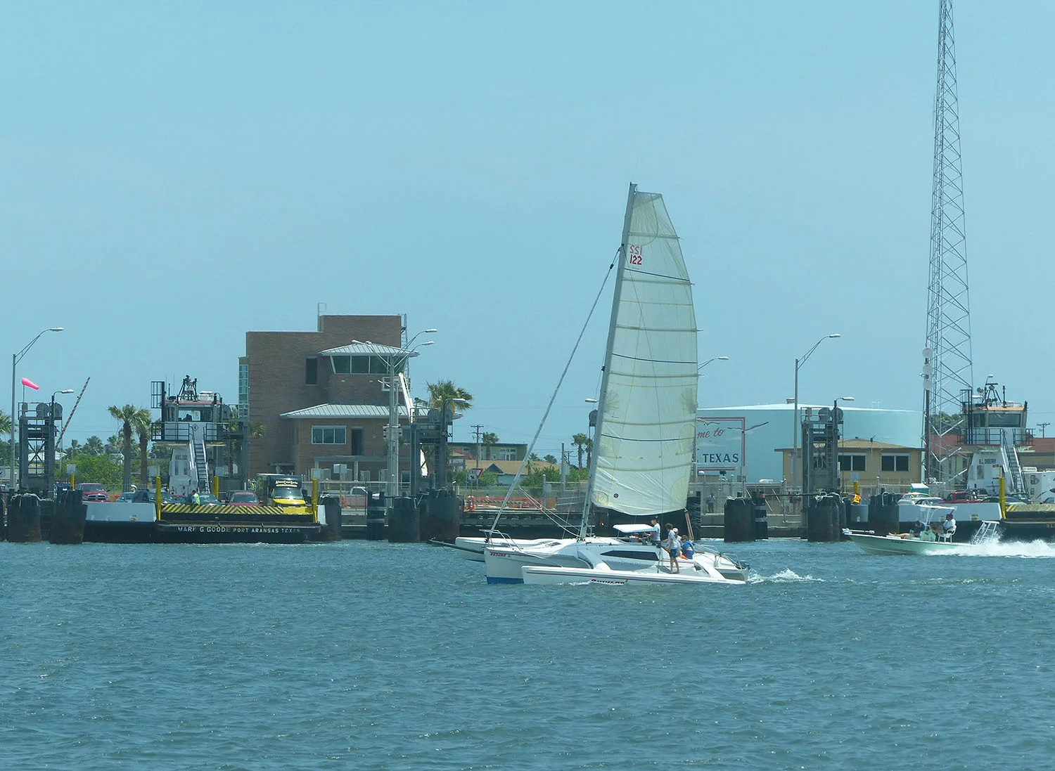 Waiting for sailboat to pass so ferry can dock