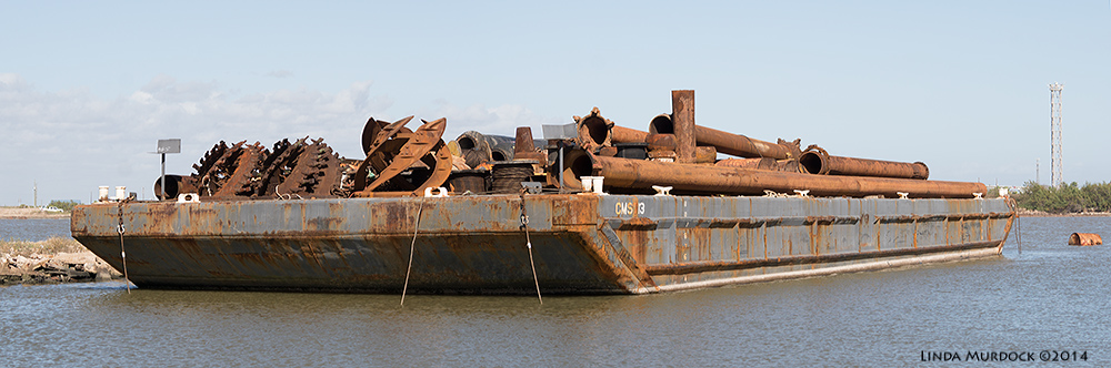  Panorama of pelican displacing barge