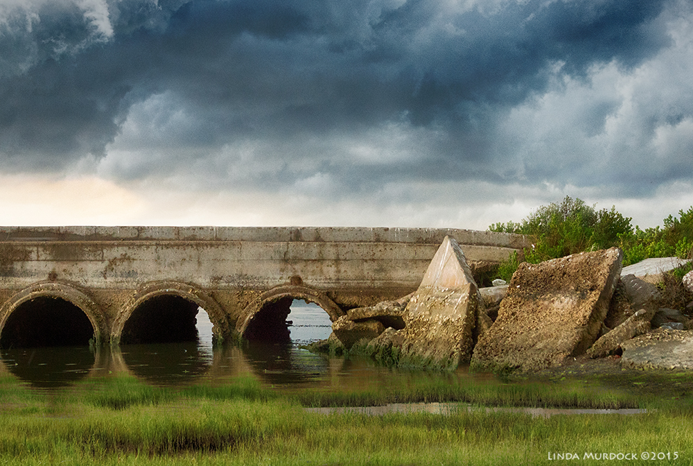 Bridge to Bryan Beach After the impending rain, the water level was to the top of the culverts