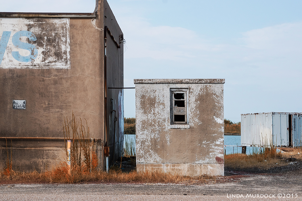 Derelict marine paint store at Freeport Sony A77II with Sony DT 16-50mm f/2.8 SSM f/8.0 1/640 sec ISO 400