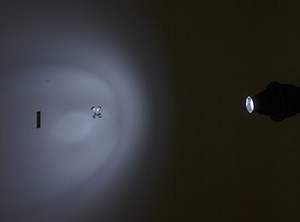 Here we can clearly see the effect a snoot creates on a white wall. The light is being channelled and bounced around until it leaves the end of the snoot; the resulting light has many light and dark resulting elements rather than an even spread of light. This is fine for hair lights and edge lights, but for a key light it's definitely not ideal.
