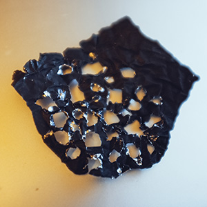 Small sheet of Cinefoil, punctured with holes and placed into the gobo holder.