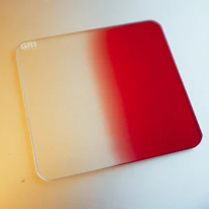 A graduated lens filter. These are really designed for landscape photographers to hold in front of their lenses to enhance sunsets but in this instance I'm using it in my Universal Spot Attachment to create graduated gels.