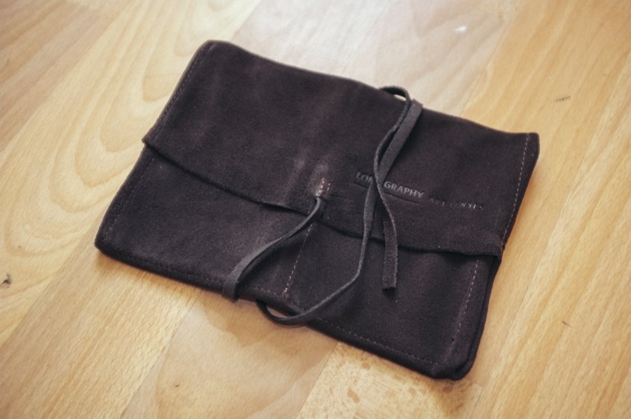 A leather lens pouch that anybody who's spent this much on a lens would never use….ever
