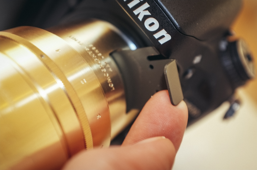 This is Petzval lens attached to my Nikon d600 and you can see that the dust-plate can't be removed with the lens attached to the camera body.