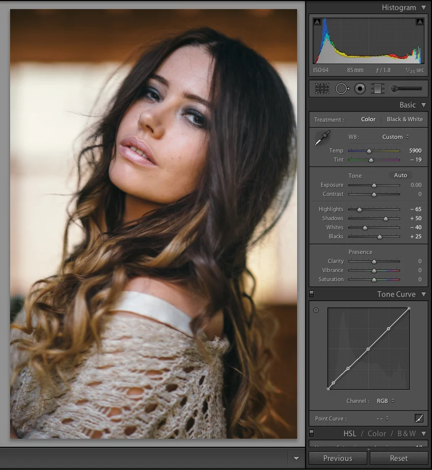 A shot taken in front of a daylight window with a CTB gel on our key light with manual Kelvin values applied.