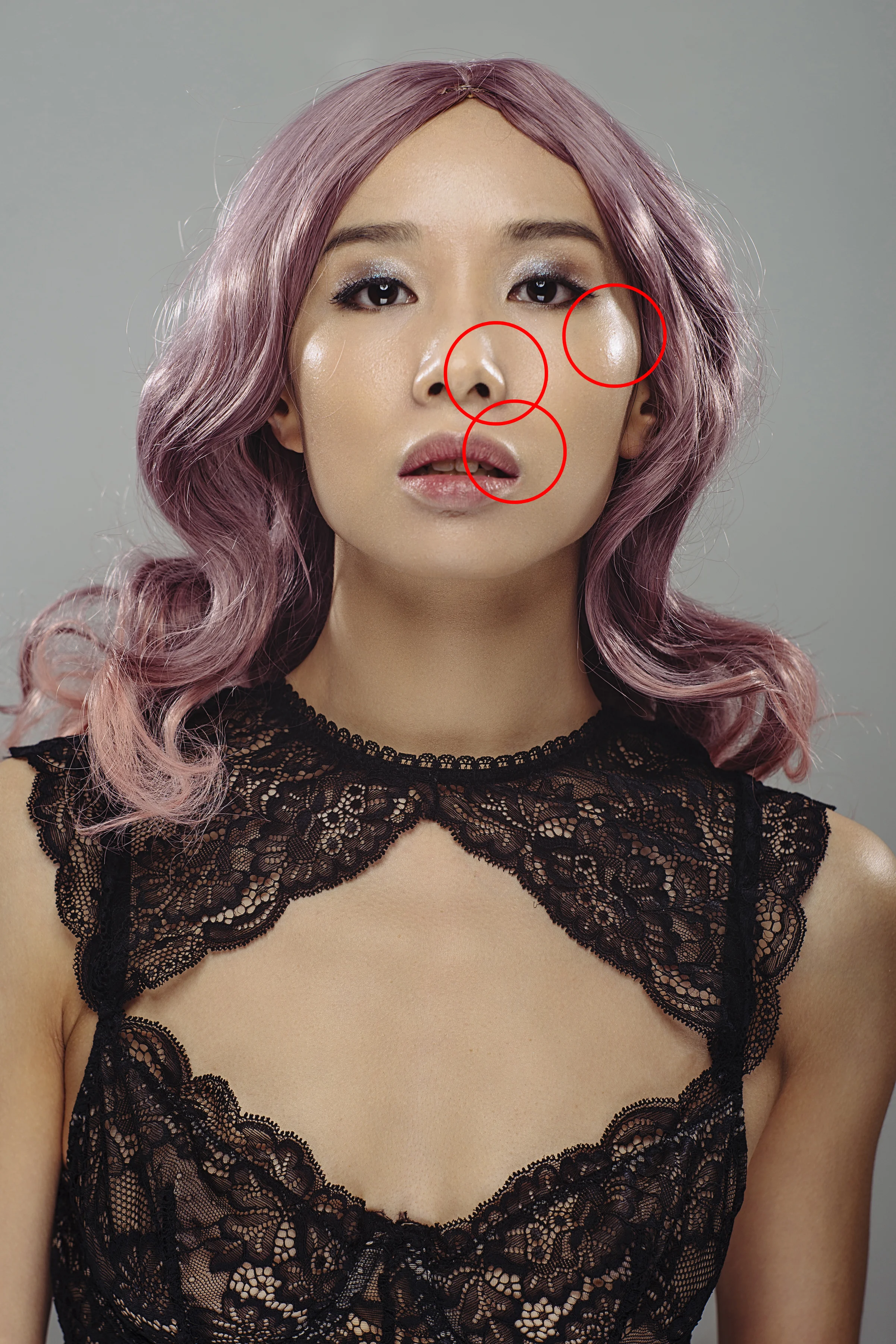 In this image I have no added my two hair lights behind our model and they're pointing back to camera. At the moment we have an awful lot going on in this shot, yes we've lit the hair but we've also added a lot multiple highlights and visual distractions.
