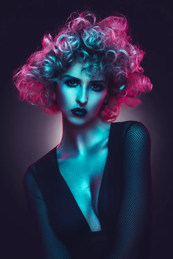 Using a grey backdrop is an excellent way to get strong and contrasty vignettes behind the model with white light. They're perhaps not the best choice however if you're planning on gelling them.