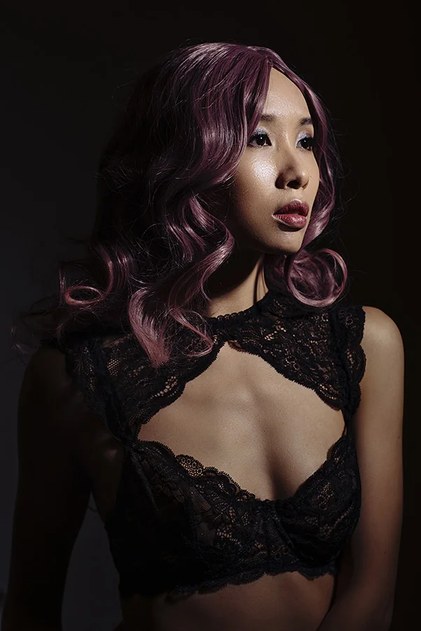 One light portrait away from background.