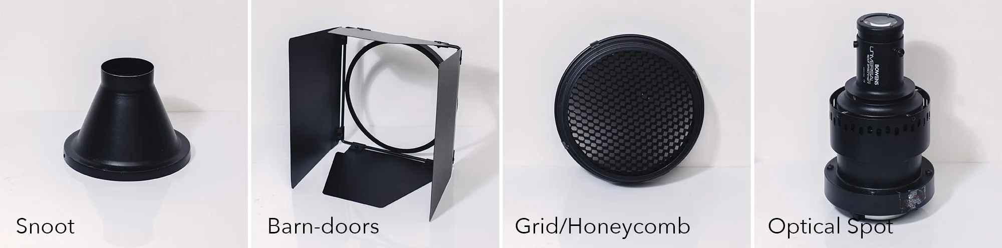 Hard light modifiers include snoots, barn doors, grids/honeycombs and optical spots.