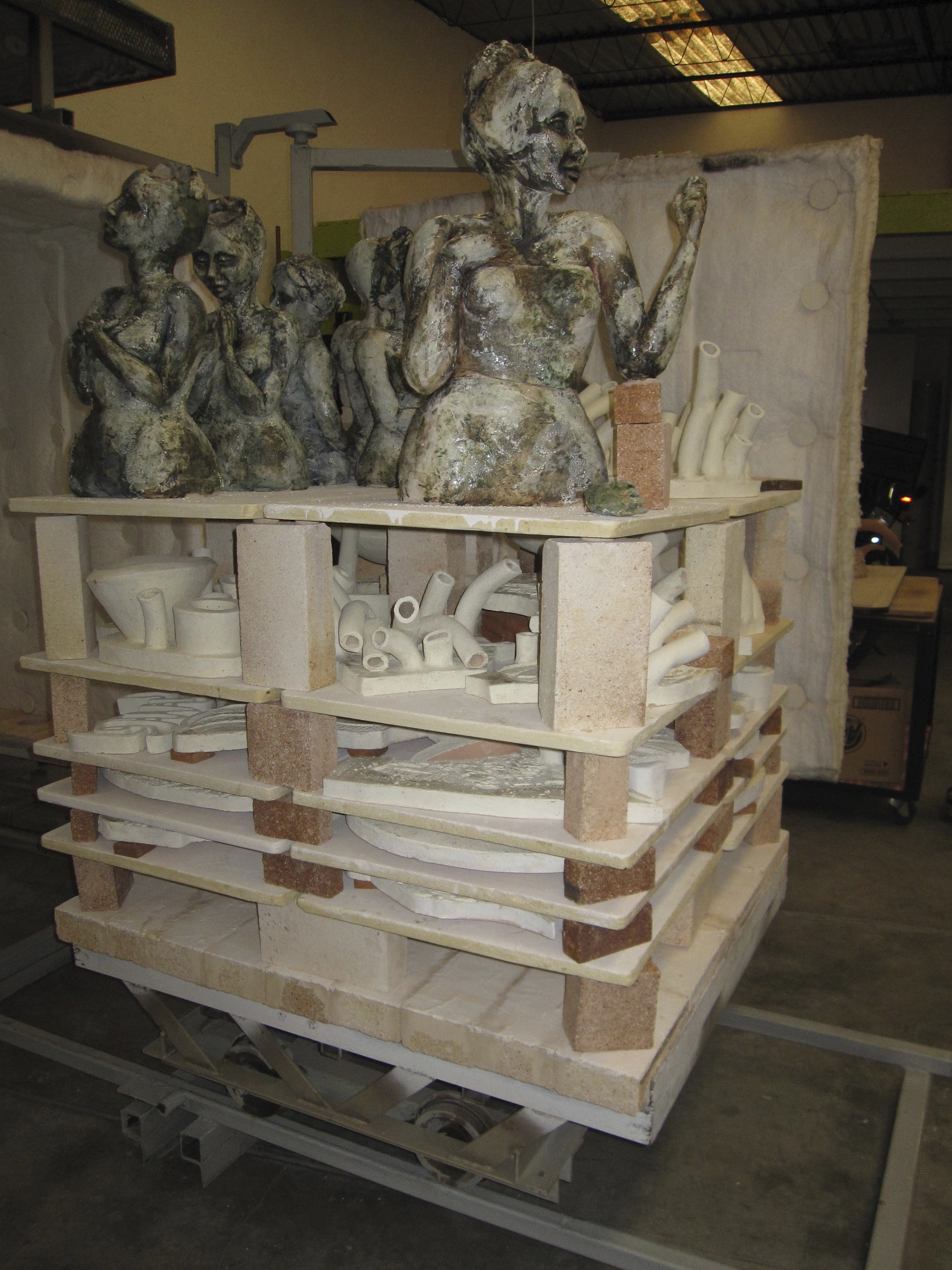 kiln ready to unload - female figure sculptures by Annie Evans