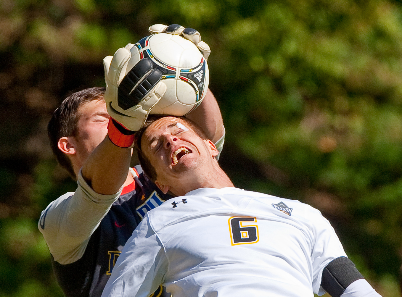  Towson University men's soccer defenseman, Daniel Grundei, attempts to take the game into overtime with a diving header on Oct. 13, 2012 in Baltimore, Md.  
