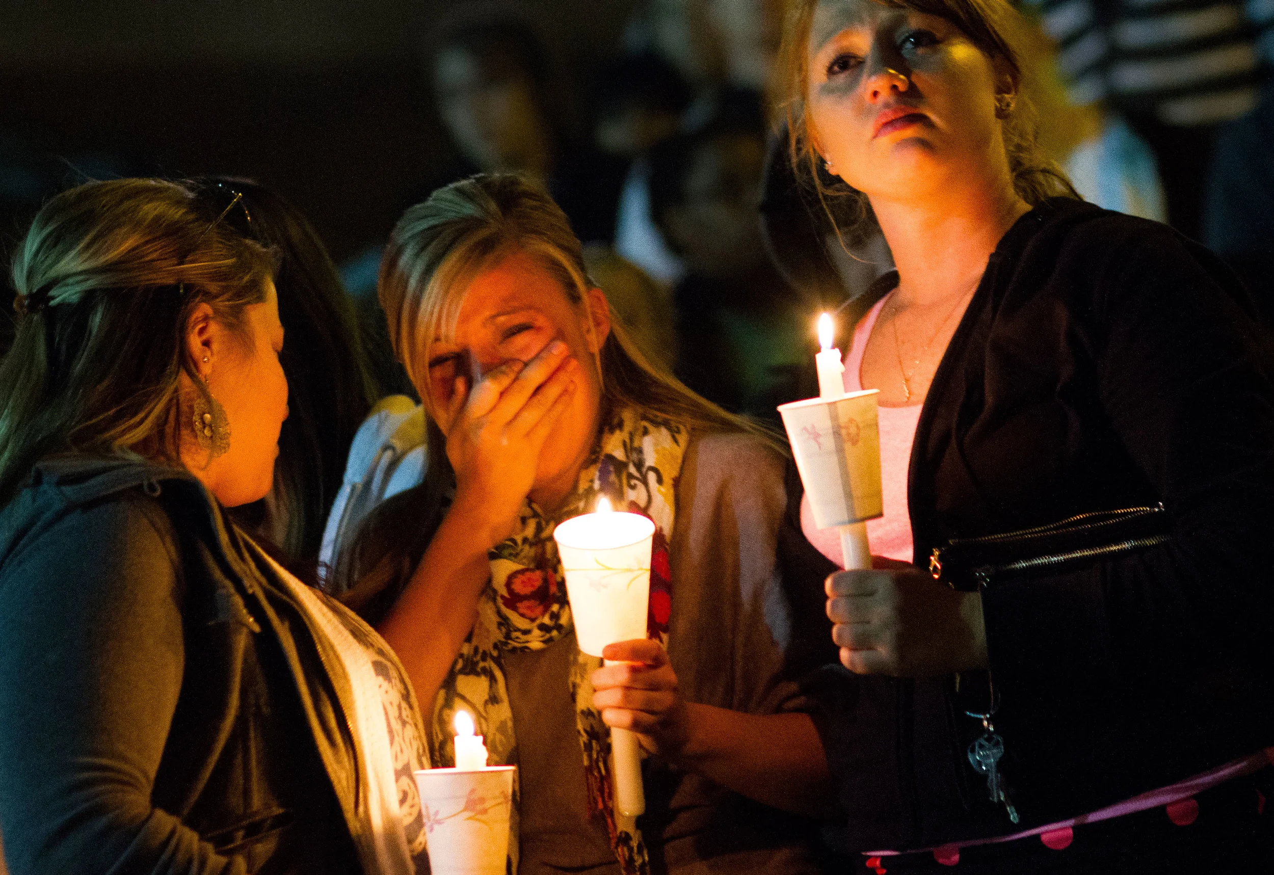 Towson University students gather together to mourn the death of two
fraternity members who died over the same weekend in two separate
incidents on March 31, 2012 in Baltimore, Md.