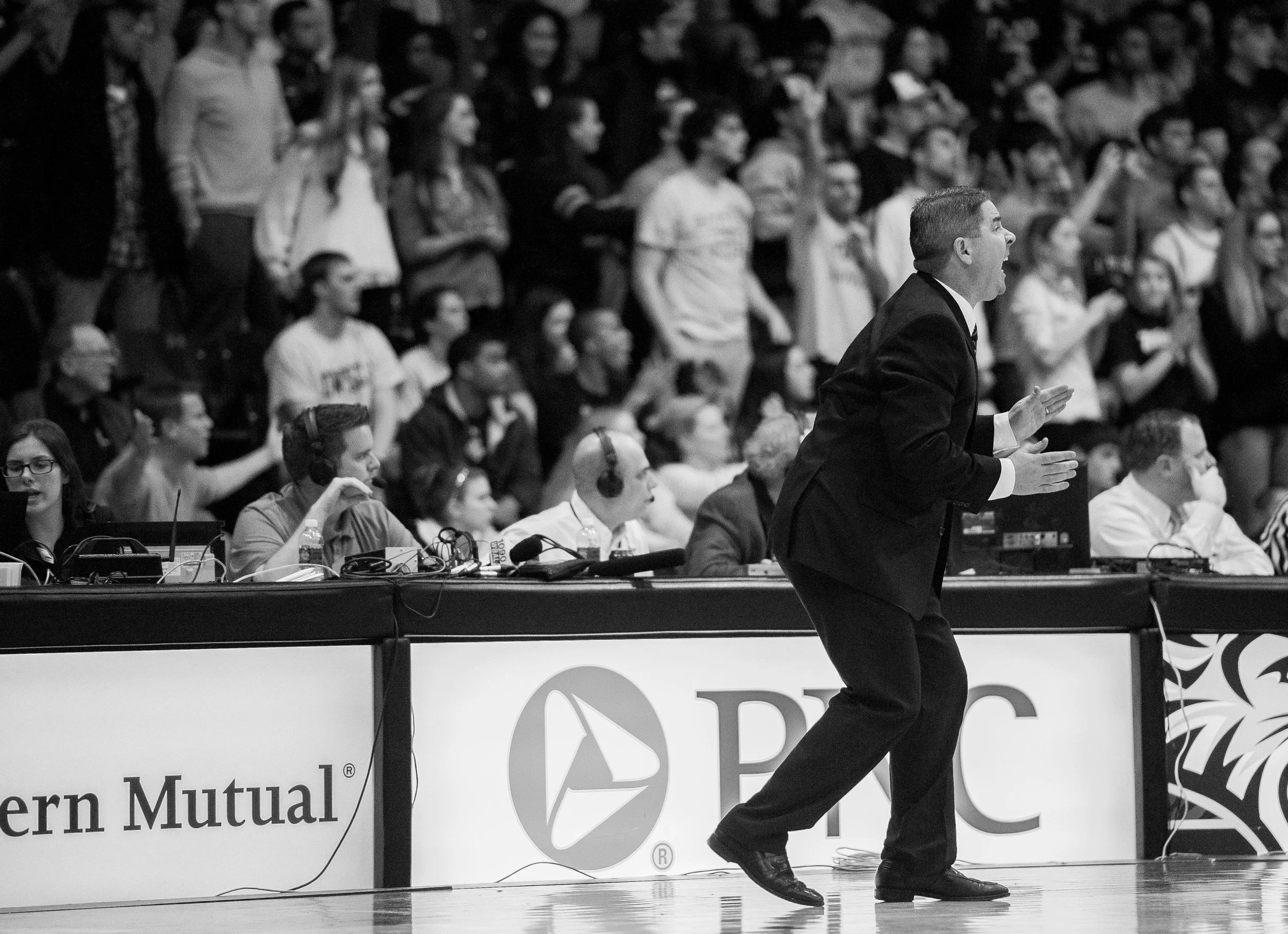 Towson University men's basketball head coach Pat Skerry screams across the court while the clock runs short during the last game of their 2012-2013 season on March 2, 2013 in Baltimore, Md.