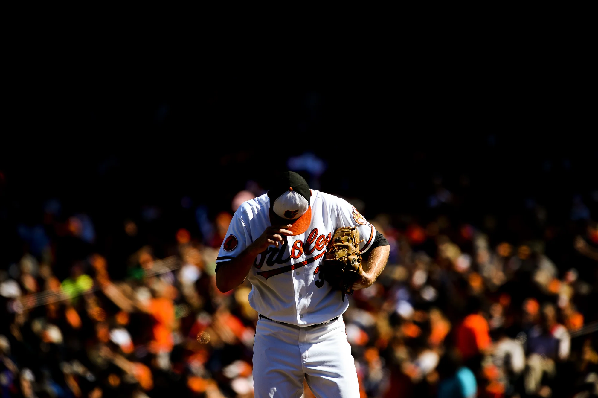 Baltimore Orioles pitcher Chris Tillman prepares himself during a home game against the Boston Redsox on Sept. 29, 2013 in Baltimore, Md.