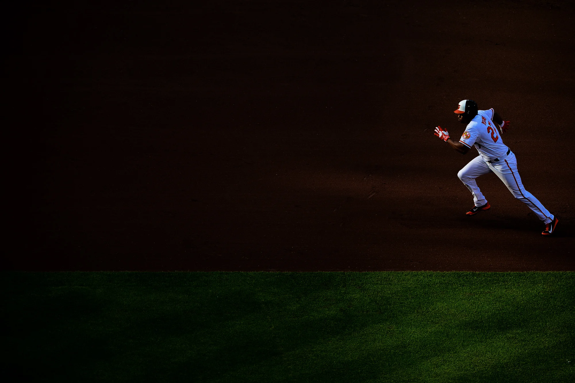 Baltimore Orioles' Delmon Young runs toward third base during a home game against the Pittsburgh Pirates at Oriole Park at Camden Yards in Baltimore, Maryland on May 1, 2014.