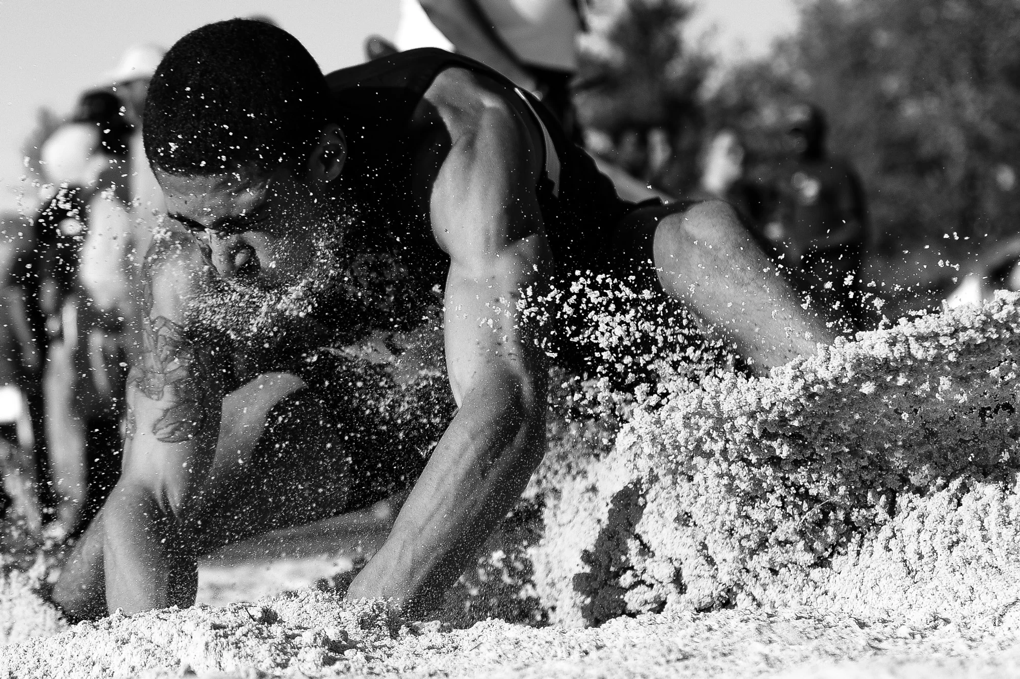 Martin Howard of Howard High School competes in the long jump competition on the second day of the Howard County Track Championships at Wilde Lake High School in Columbia, Maryland on May 6, 2014.