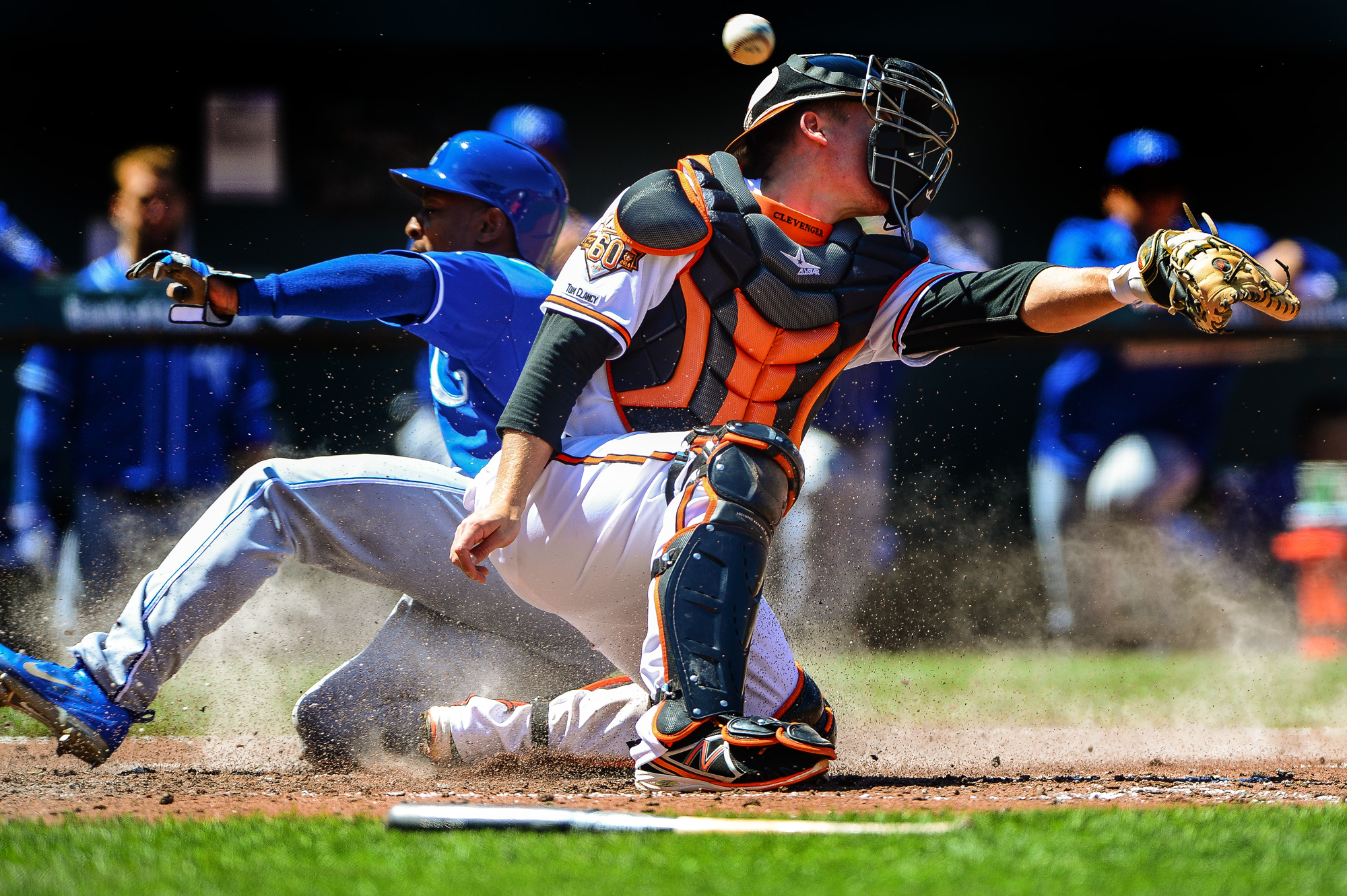  Baltimore Orioles catcher Steve Clevenger misses the play at home while Jarrod Dyson of the Kansas City Royals scores at Oriole Park in Camden Yards in Baltimore, Md. on April 27, 2014. 