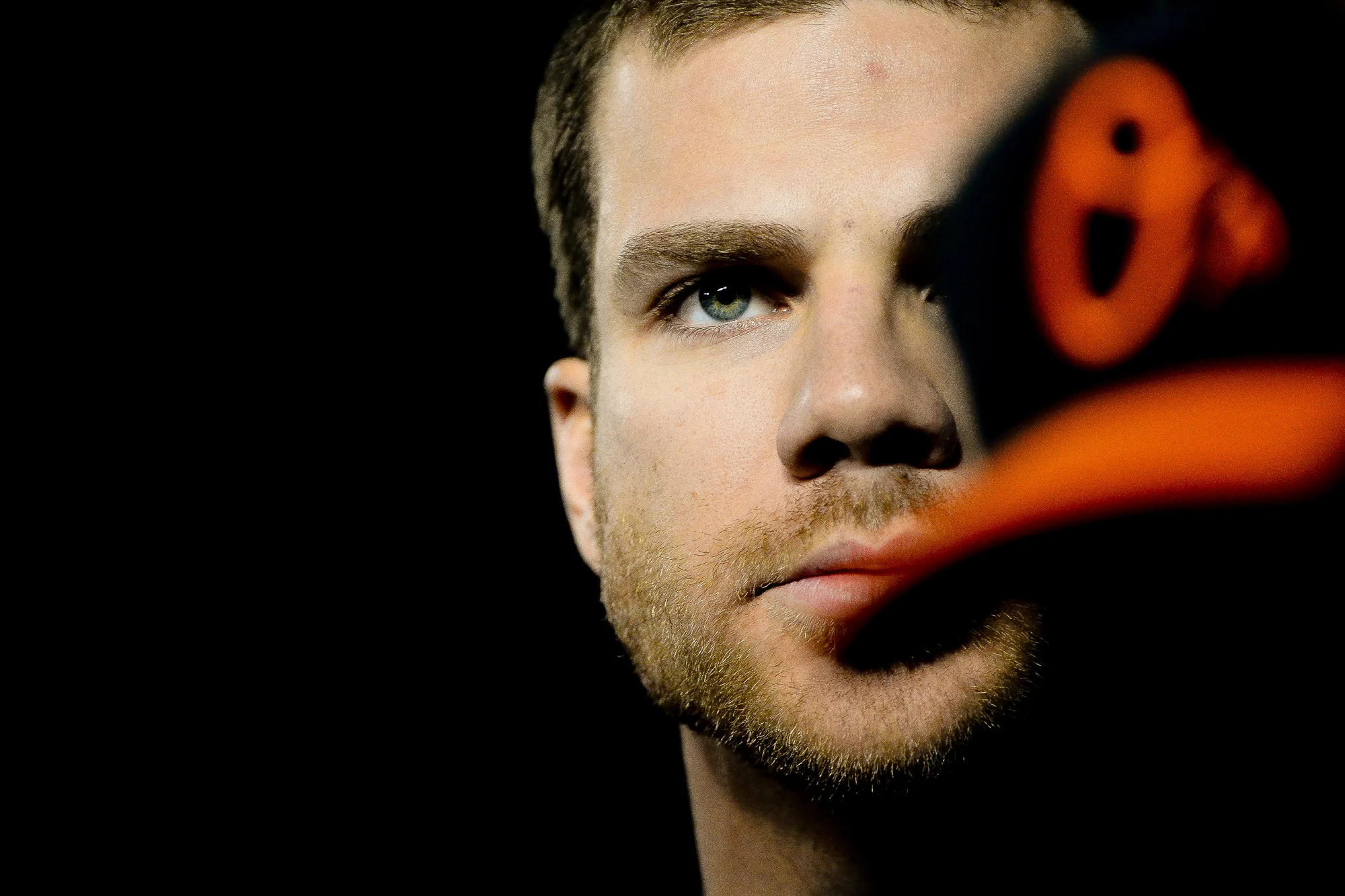 Baltimore Orioles first baseman Chris Davis stands in the dugout before preparing for an at bat in the first inning of a home game on April 25, 2014 in Baltimore, Md. 