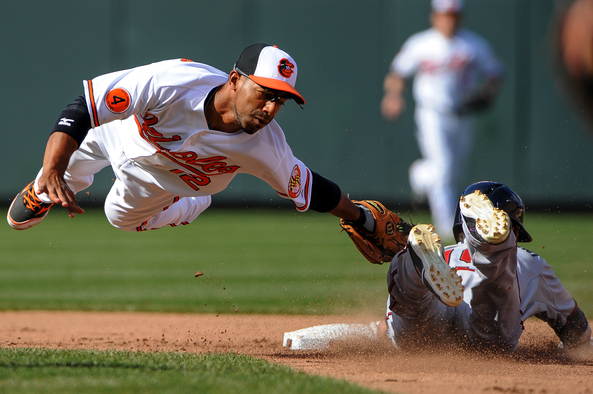  Baltimore Orioles second baseman Alexi Casillas makes the tag in the top of the fifth inning against the Minnesota Twins on April 7, 2013 in Baltimore, Md. 