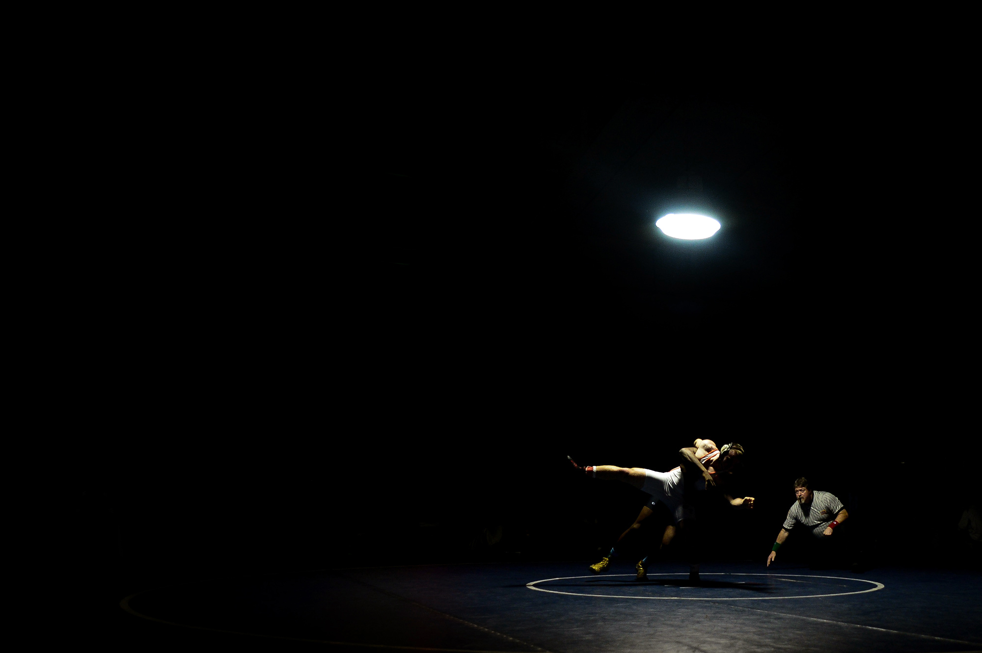 Billy Hess, back of Hereford throws Malcolm Johnson, front, of North County in their 195 pound weight bout match at the Franklin Invitational on Jan. 18, 2014.