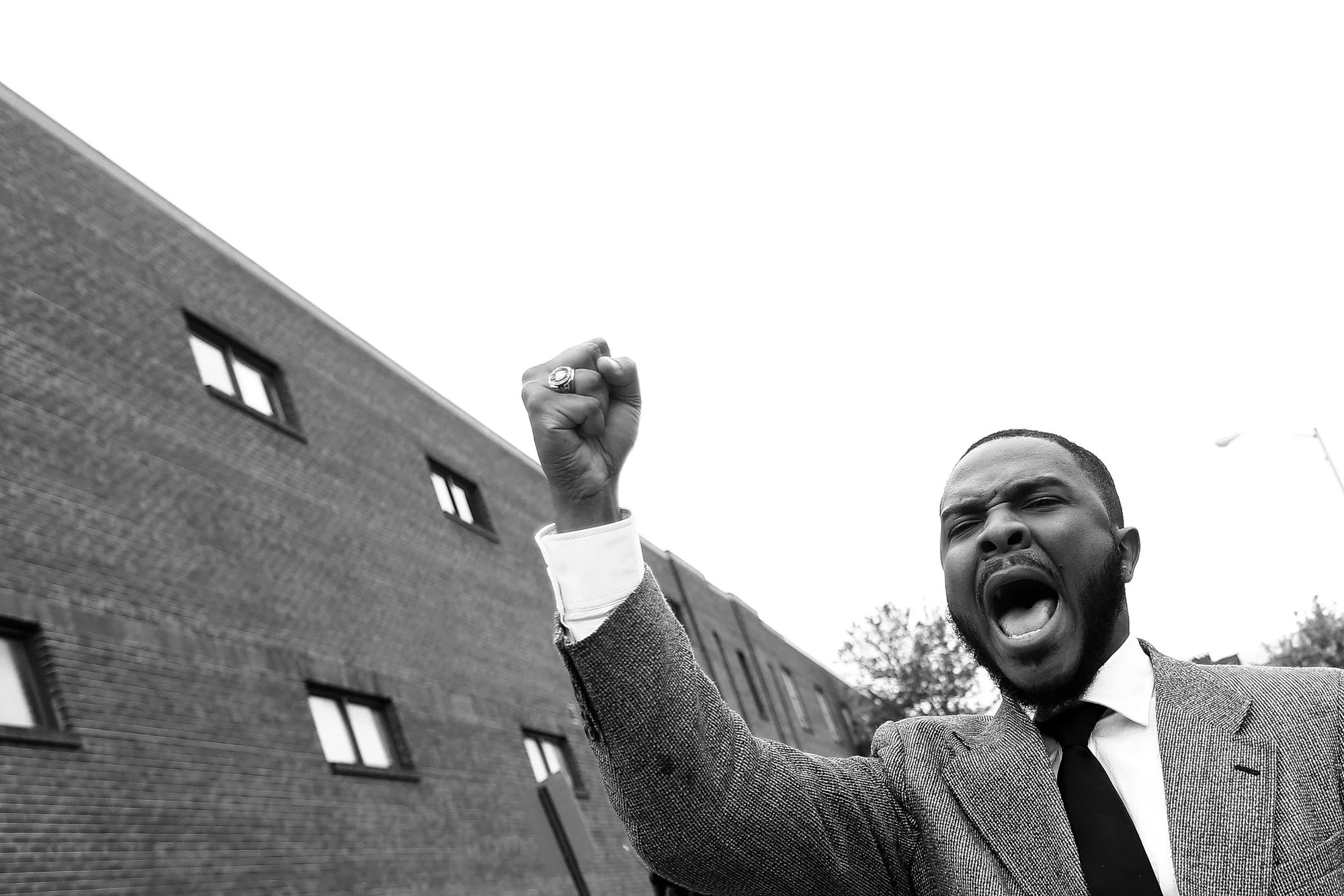 Protestors march around the Baltimore City Detention Center on 401 E. Eager Street after the announcement that all six officers will be charged following the death of Freddie Gray while he was in police custody, May 1, 2015 in Baltimore, Maryland.
