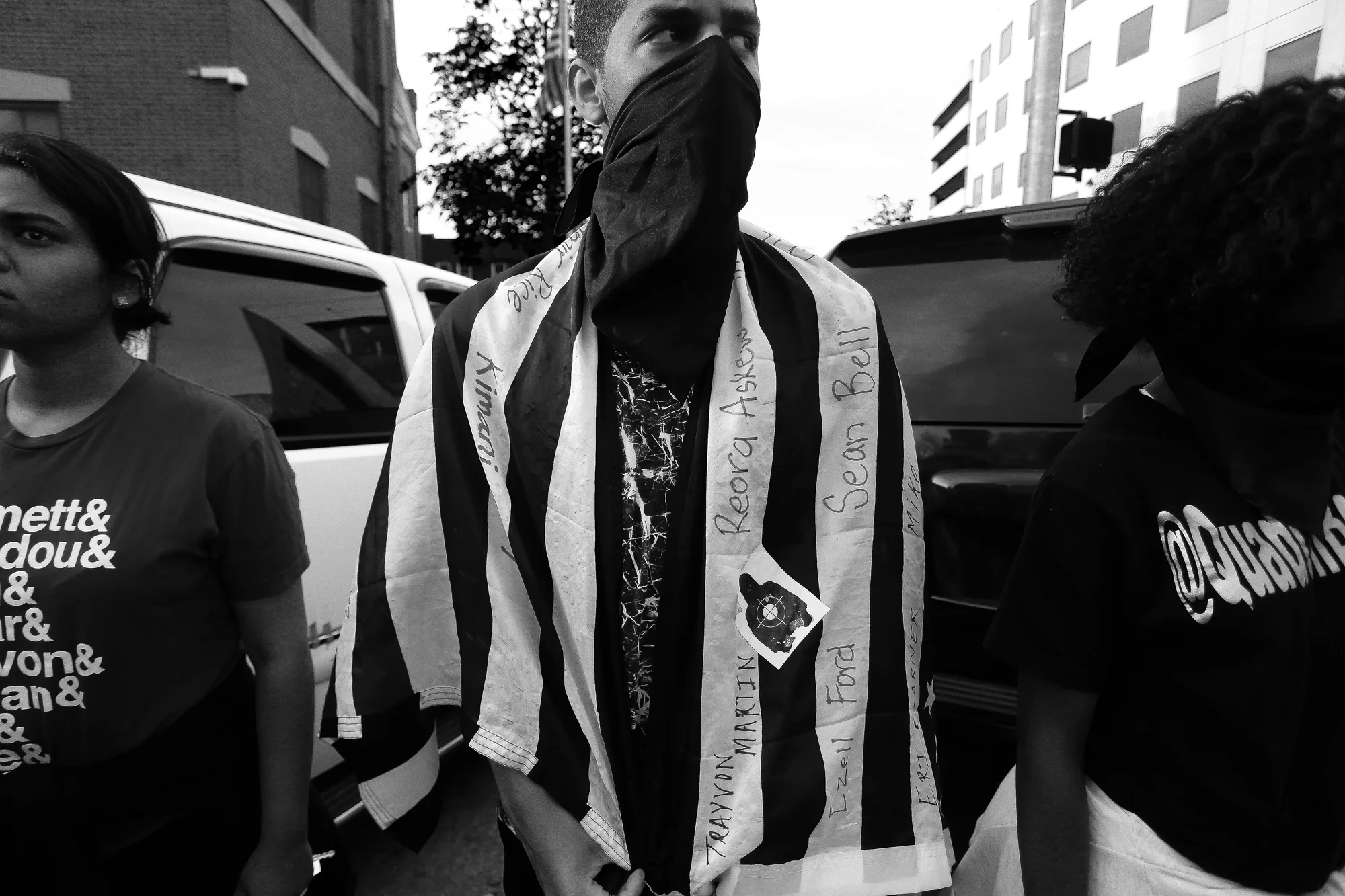 A protestor stands in front of City Hall during a protest in response to the death of Freddie Gray while he was held in police custody, April 29, 2015 in Baltimore, Maryland.