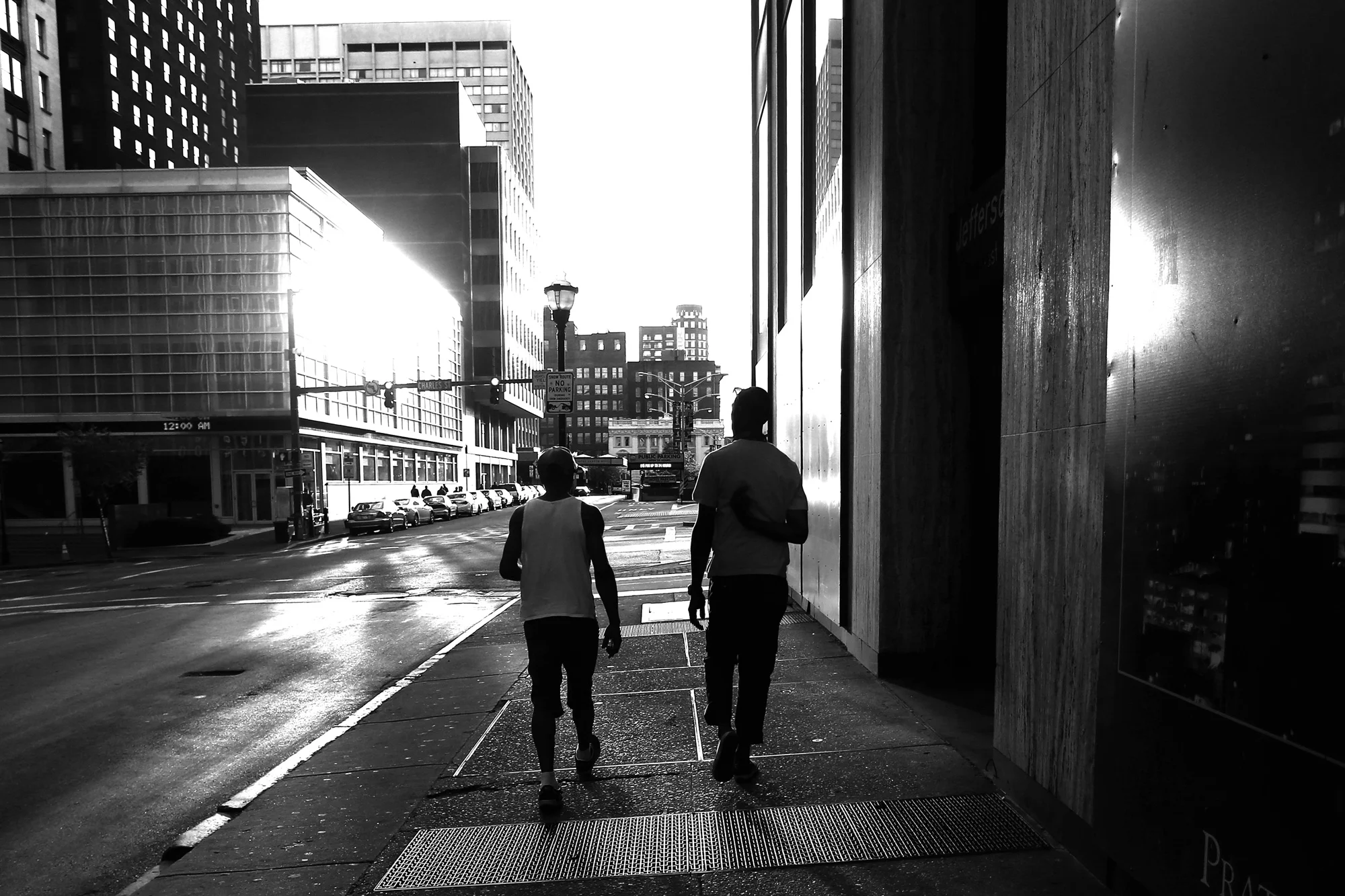 Individuals walk after a protest in response to the death of Freddie Gray while he was held in police custody, April 29, 2015 in Baltimore, Maryland.