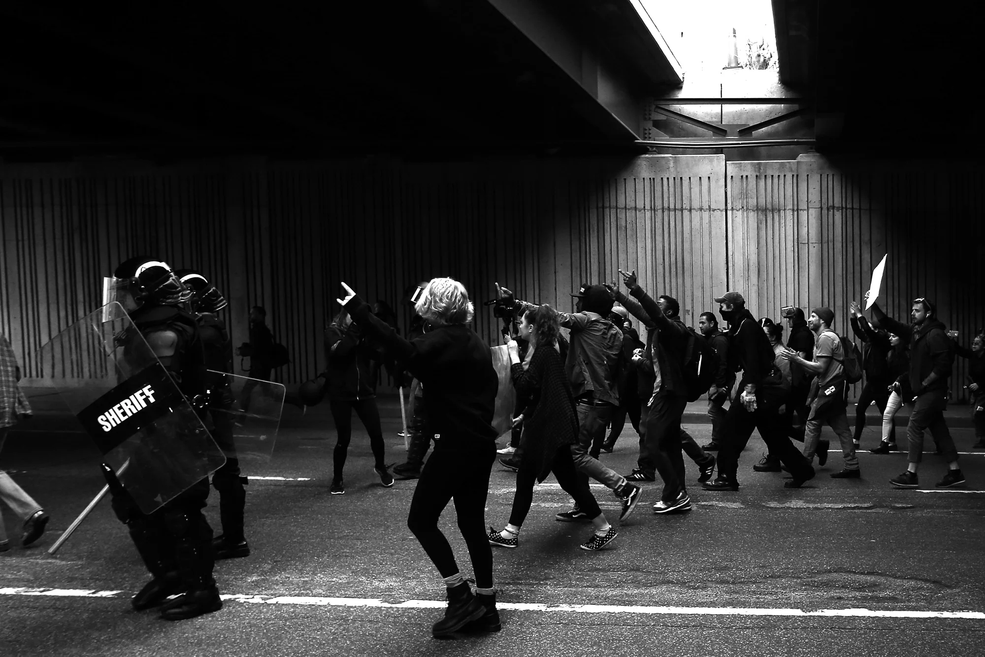 Protestors march to the Baltimore City Detention Center on 401 E. Eager Street from McKeldin Square after the announcement that all six officers will be charged following the death of Freddie Gray while he was in police custody, May 1, 2015 in Baltimore, Maryland.