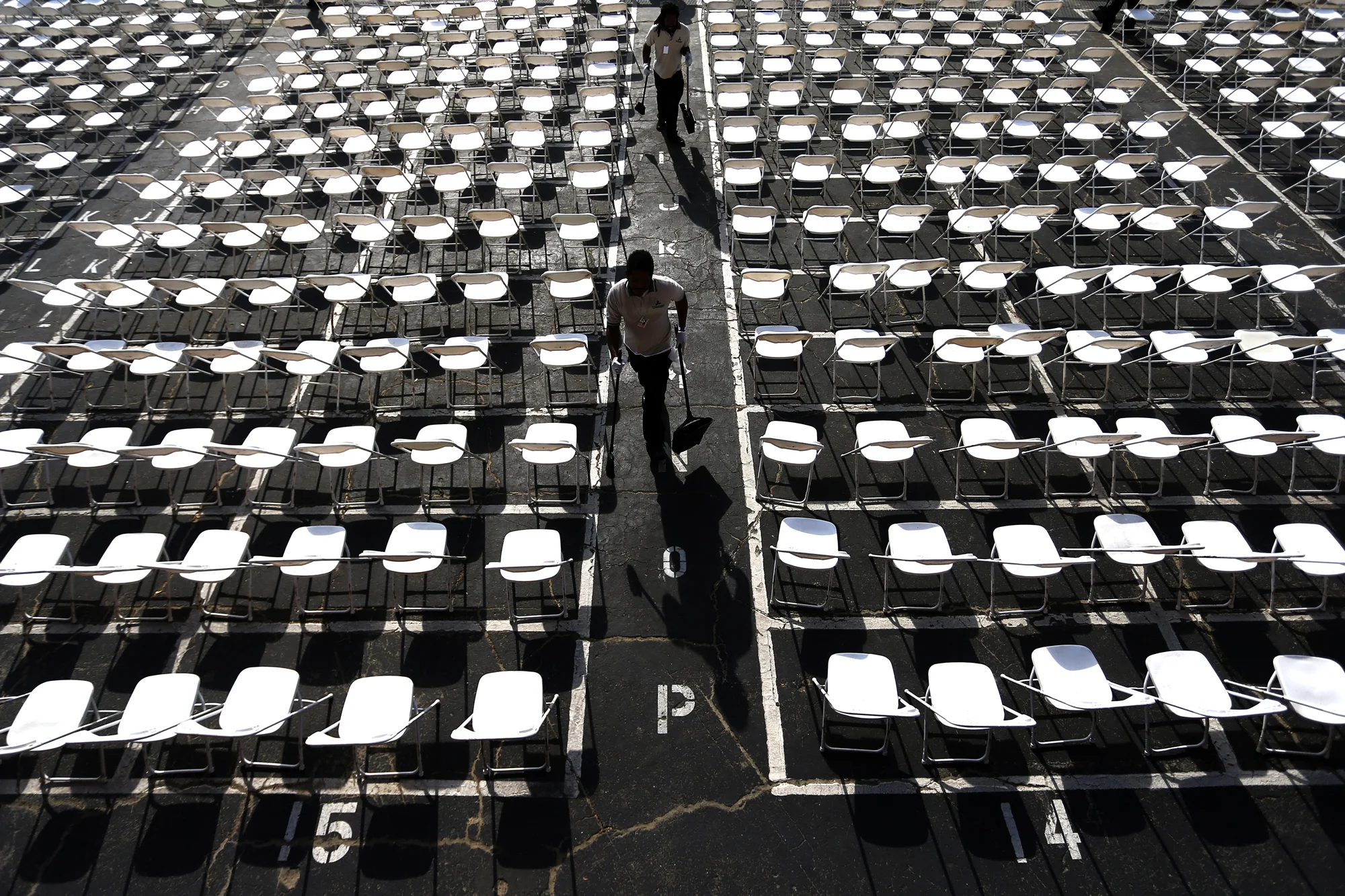 Employees clean up one day prior to the 140th Preakness Stakes at Pimlico Race Course on May 15, 2015 in Baltimore, Maryland.