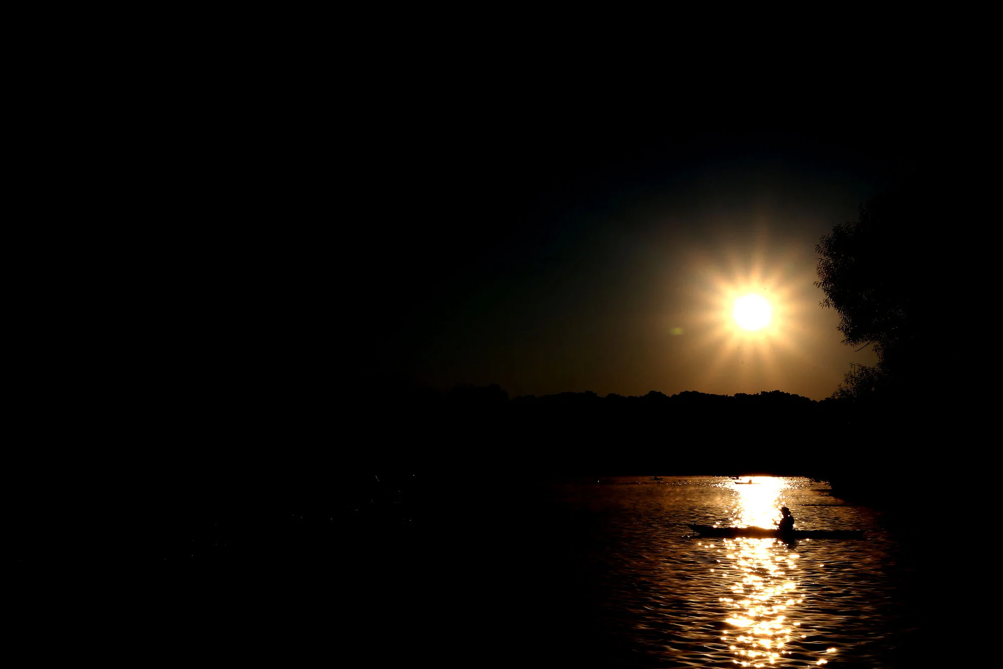 Lifeguards keep watch over swimmers during the 10th annual Iron Girl Triathlon at Centennial Park in Ellicott City on Sunday, August 16, 2015.