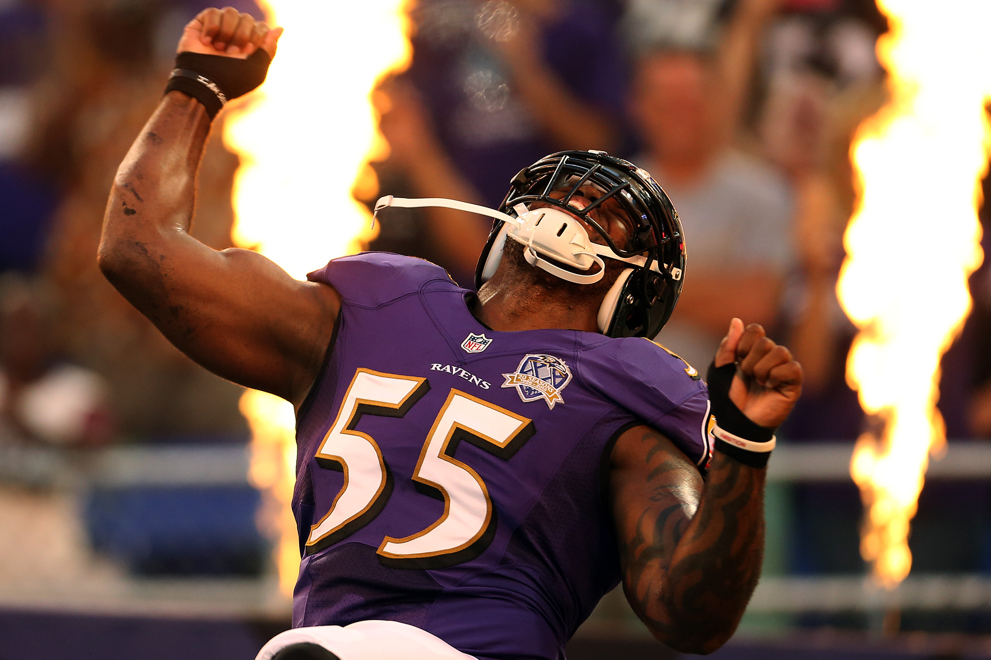  Outside linebacker Terrell Suggs #55 of the Baltimore Ravens is introduced prior to the start of a preseason game against the Washington Redskins at M&amp;T Bank Stadium on August 29, 2015 in Baltimore, Maryland. 