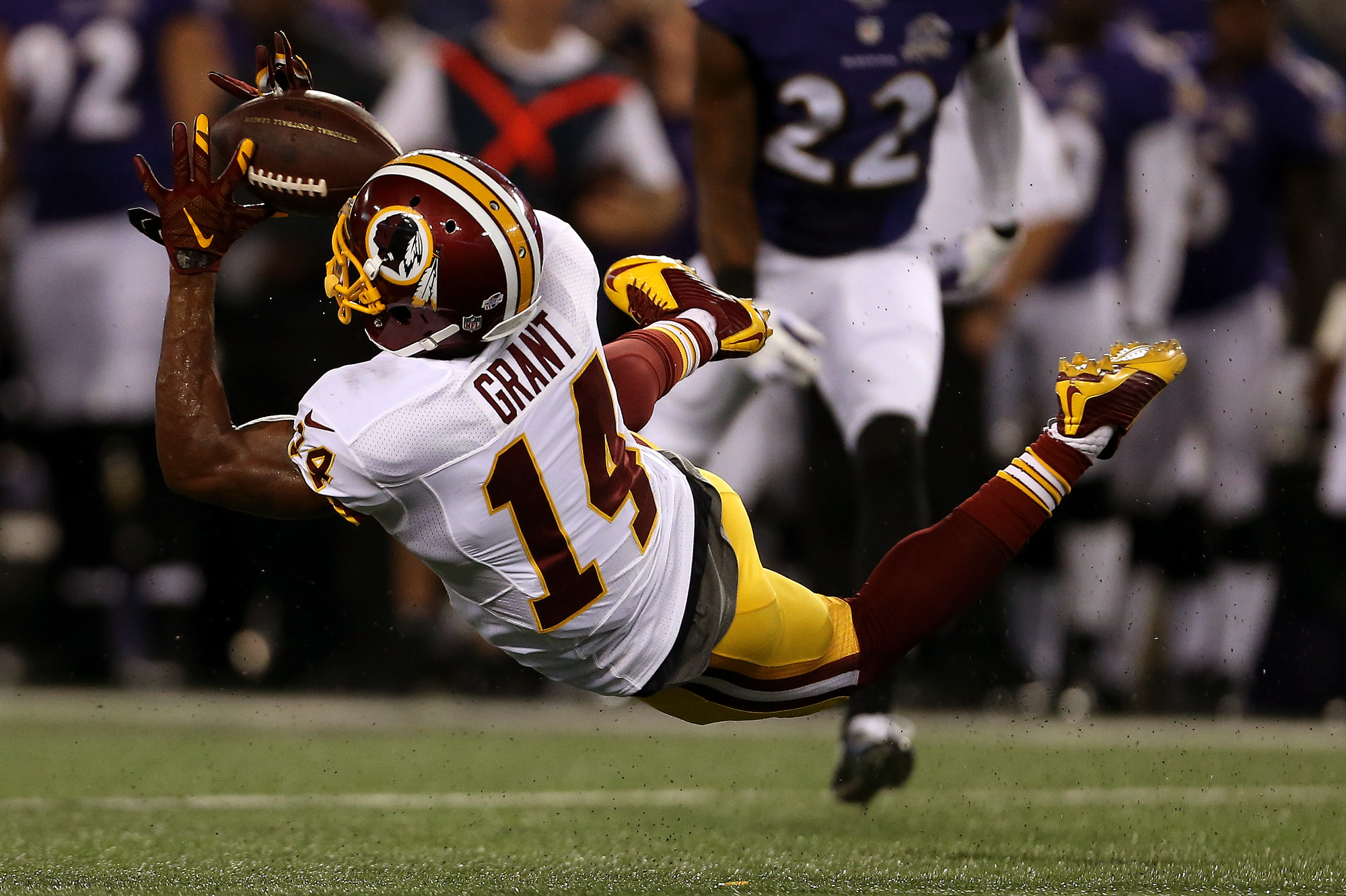  Wide receiver Ryan Grant #14 of the Washington Redskins misses a catch in the first quarter of a preseason game against the Baltimore Ravens at M&amp;T Bank Stadium on August 29, 2015 in Baltimore, Maryland. 