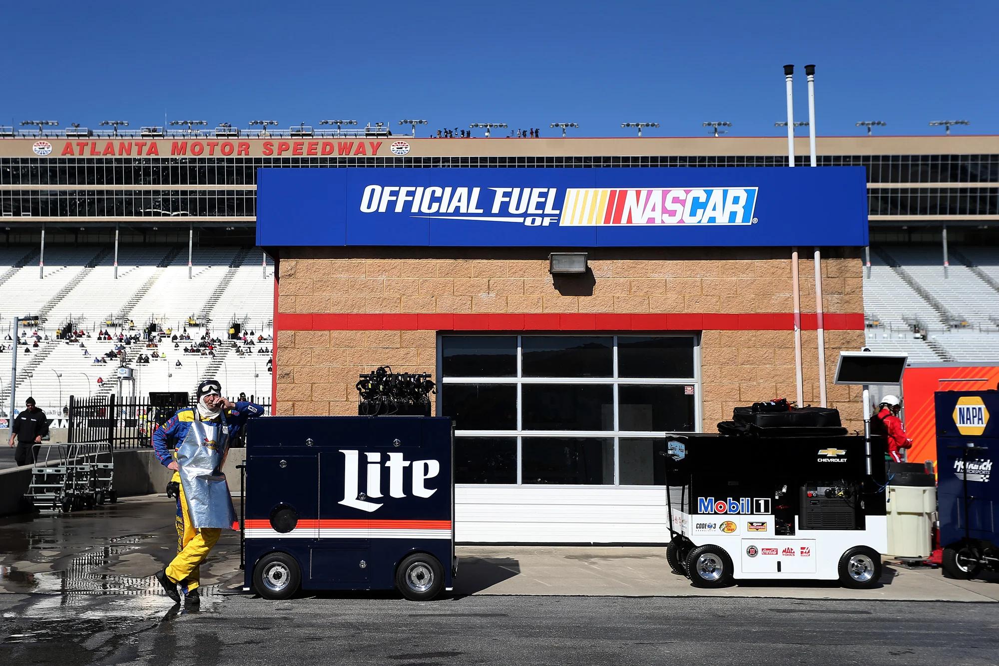 A crew member looks on during the NASCAR Sprint Cup Series Folds of Honor QuikTrip 500 at Atlanta Motor Speedway on February 28, 2016 in Hampton, Georgia.
