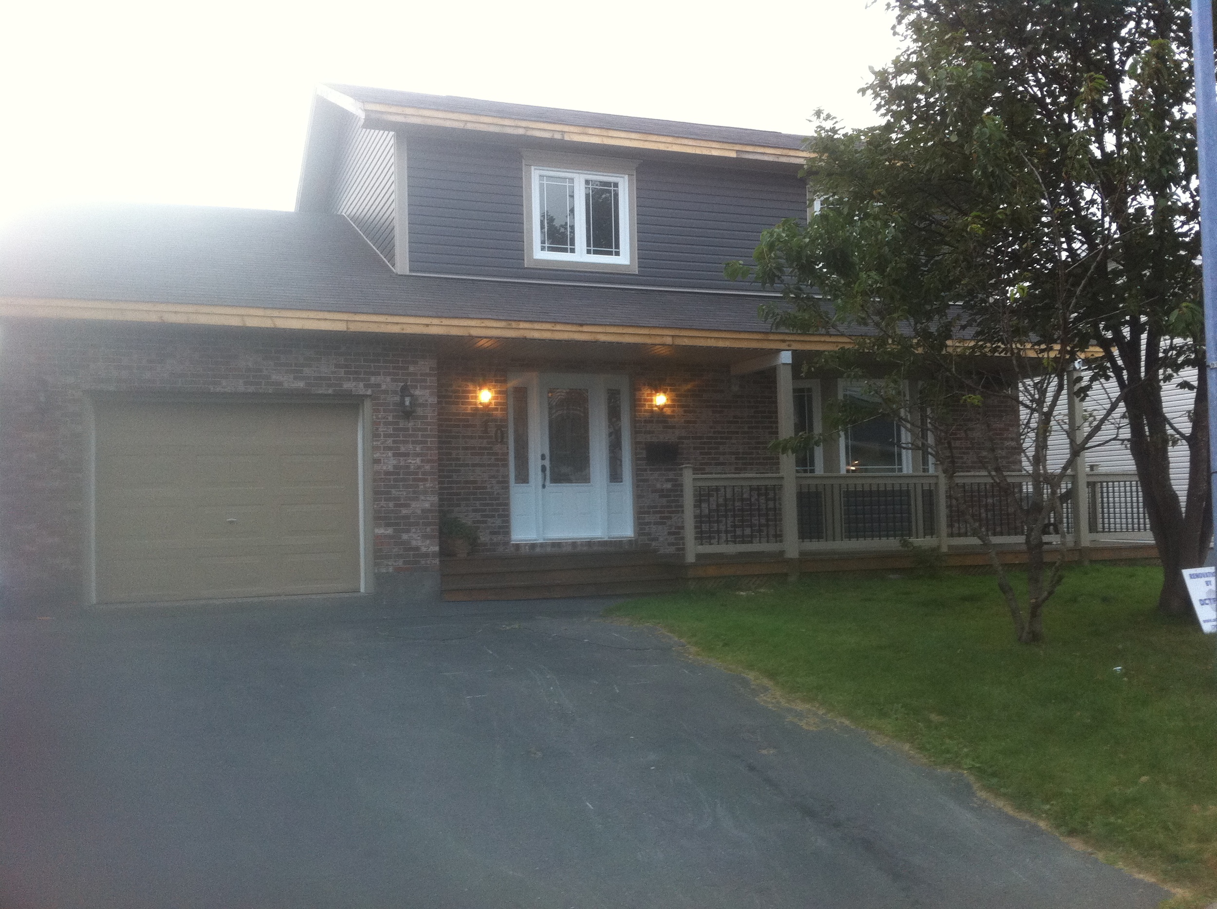 New windows, doors, siding, shingles and porch rail