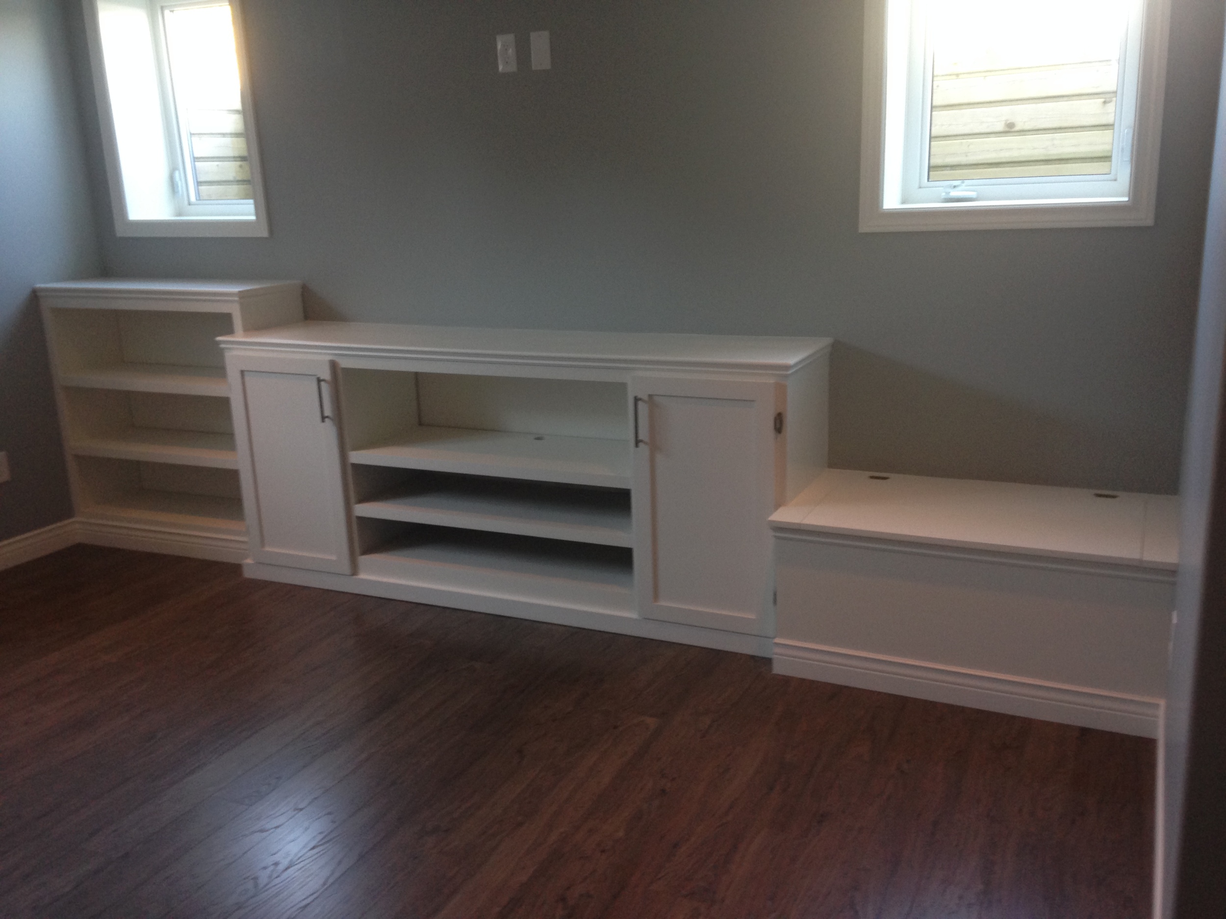Custom media unit with shelves and bench storage
